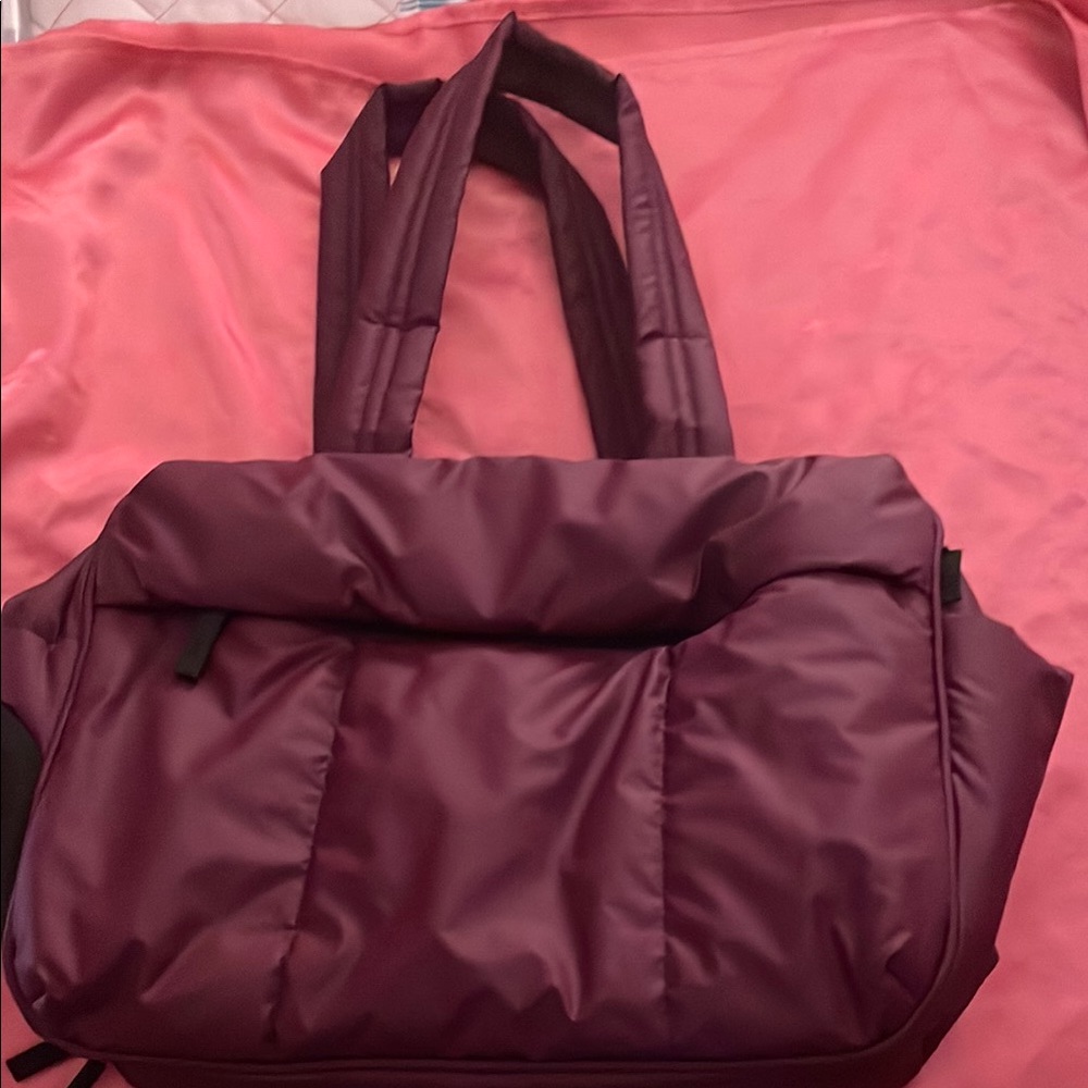 Calpak Plum Travel Bag with Quilted Fabric and Sturdy Handles